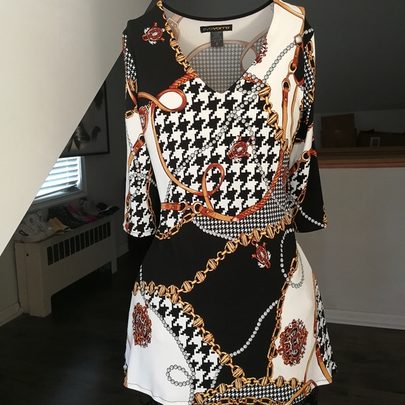 evovorro Dresses & Skirts - Evovorro Nice print design dress size S